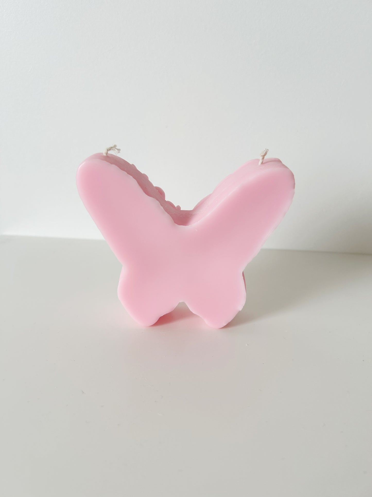 Handgegoten kaars vlinder Roze